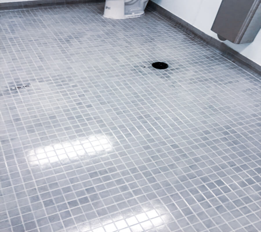 tile coating on restroom floor